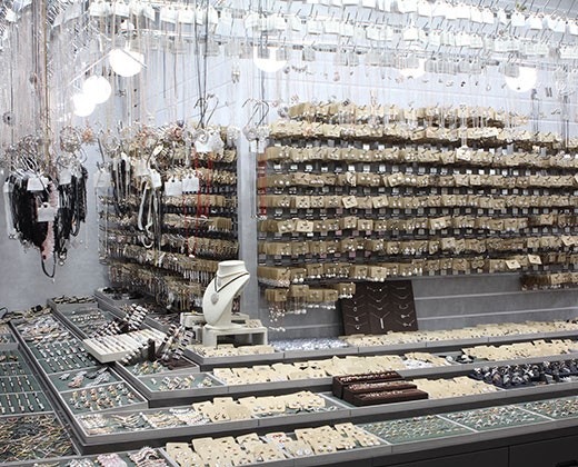 Namdaemun Market jewelry stall with rows of handmade earrings and accessories on display